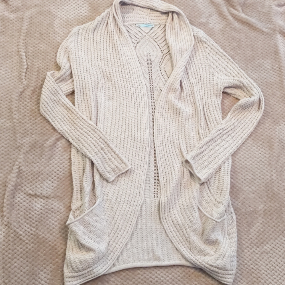 Long cream sweater with pockets